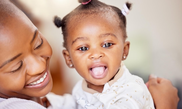 My joy is all here Shot of a mother bonding with her baby daughter at home