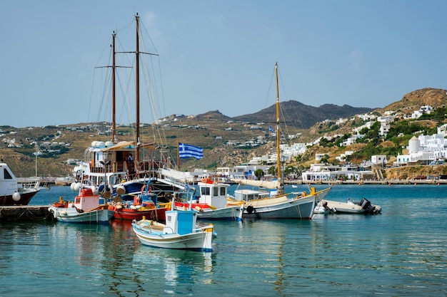 Mykonos port with fishing boats and yachts and vessels Greece