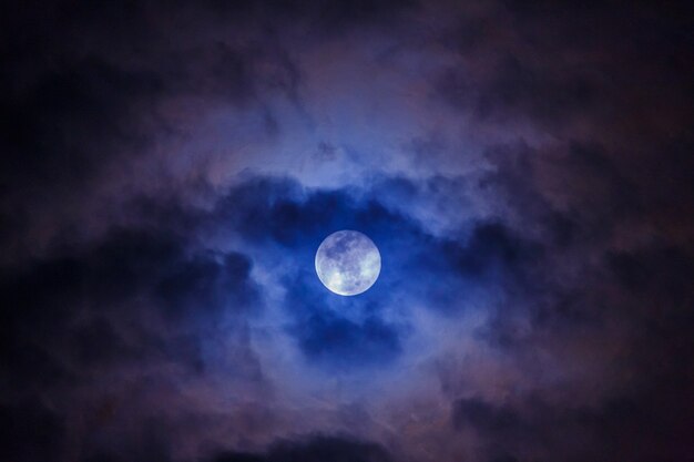 Mysterious dark night sky with full moon and cloud dark space moon and midnight halloween concept