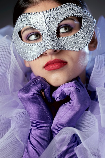 Mysterious woman with carnival mask