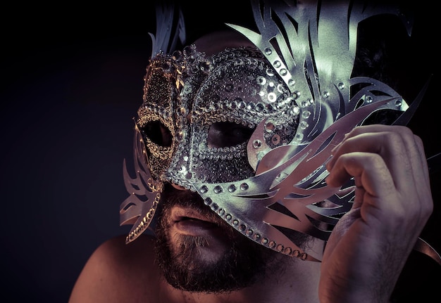 Mystery and Renaissance, adult man with mask silver and precious stones