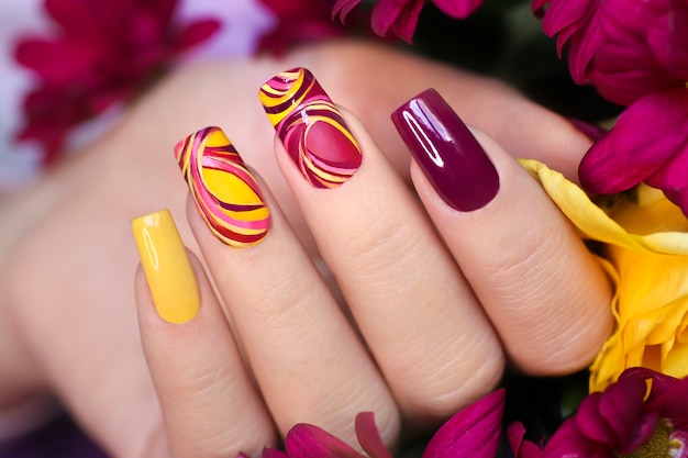 Nail design on shiny and matte nail Polish with smooth curves.