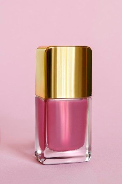 Nail polish on pink background