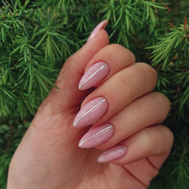 Nail print against the background of a tree