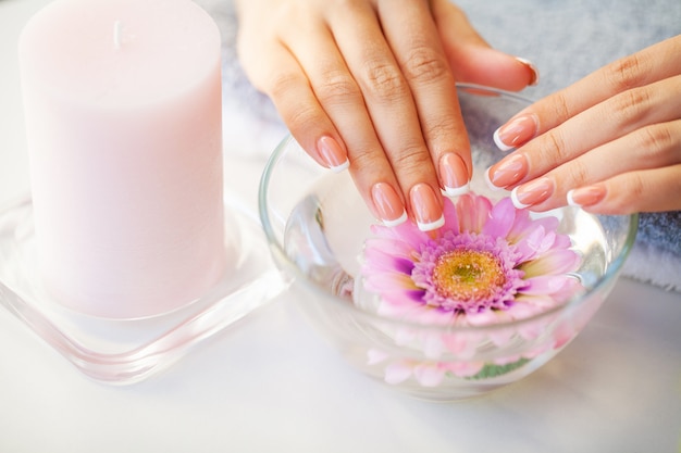 Nails care. Beautiful woman's nails with french manicure