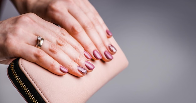 Nails Design Hands With Bright Pink Spring Manicure On Grey Background Close Up Of Female Hands Art Nail