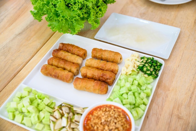 NamNeaung of Vietnamese food with roll pork vegetable and sauce