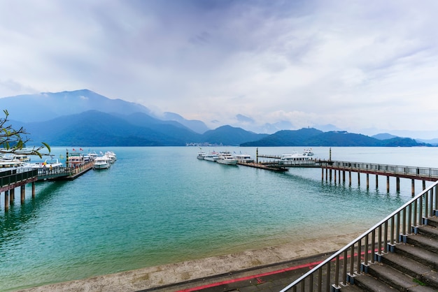 Nantou County , Taiwan - June 01 , 2018 : Tourists taking ferries at Shuishe pier to travel on Sun Moon Lake