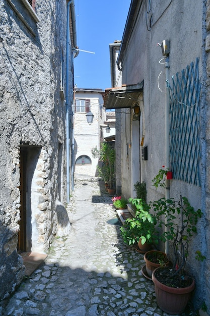 A narrow street among the old houses of Fumone a historic town in the state of Lazio in Italy