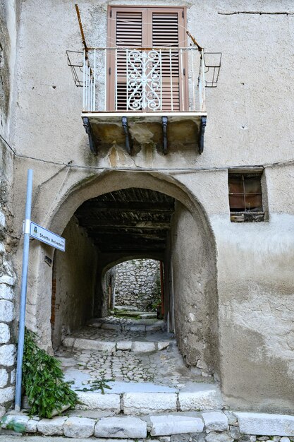 A narrow street among the old houses of Montesarchio a village in the province of Benevento Italy