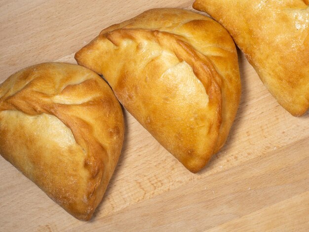 National bakery A pie with cabbage Pies with stuffing on the table Cuisine of the countries of the world