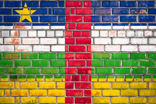 National flag of the Central African Republic on a grunge brick background