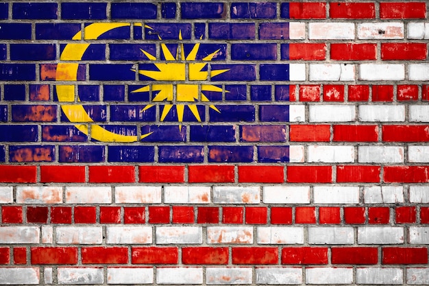 National flag of the Malaysia on a grunge brick background