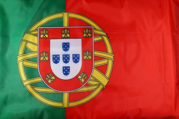 Photo the national flag of portugal displaying vibrant colors and emblematic symbols