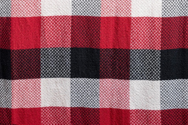 Native cotton woven in white red and black colour check pattern background