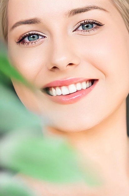 Natural beauty perfect white teeth and healthy smile beautiful woman in nature for skincare cosmetics and dental care