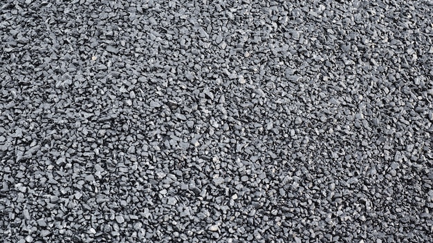 Natural black charcoal texture for background, fuel for coal industry.