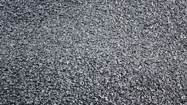 Natural black charcoal texture for background, fuel for coal industry.