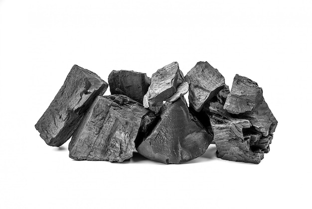 Natural black wooden charcoal isolated on white background.