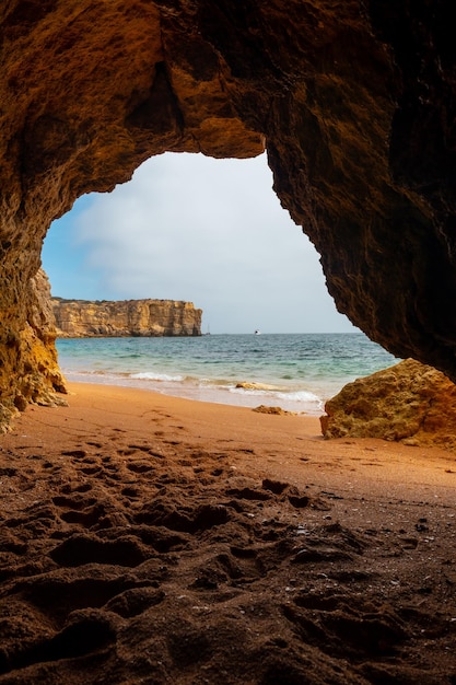 Natural cave in the Algarve on the beach at Praia da Coelha Albufeira Portugal