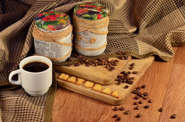 Natural. Coffee cup and a text, composed of crackers