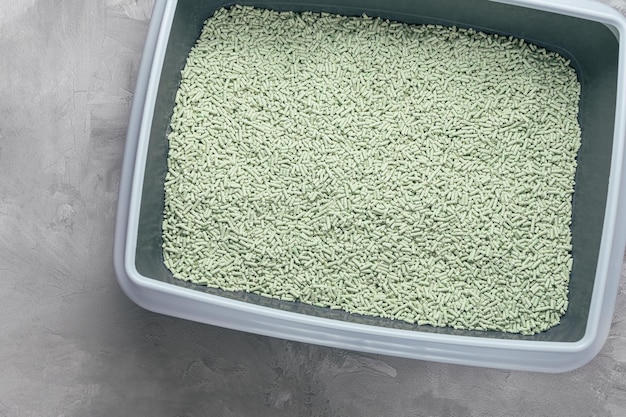 Natural ecofriendly biodegradable green tea tofu cat litter in litterbox Top view