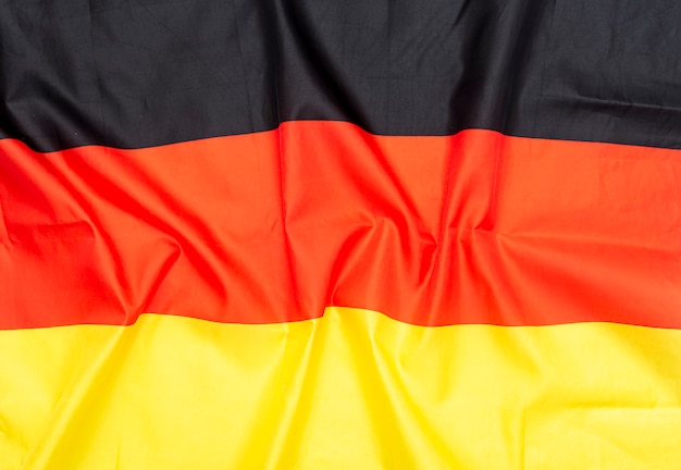 Natural fabric crumpled flag of Germany or German flag