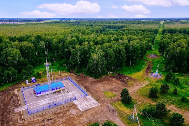 Natural gas distribution station of main gas pipeline View from above Type of gasification object on summer day