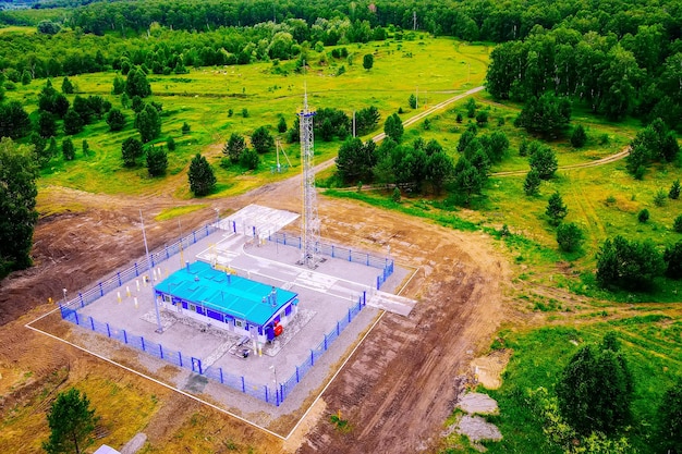 Natural gas distribution station of main gas pipeline View from above Type of gasification object on summer day