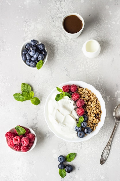 Natural greek yogurt, granola and berries. 