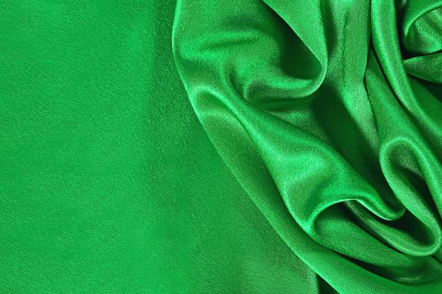 Natural green satin fabric as background texture