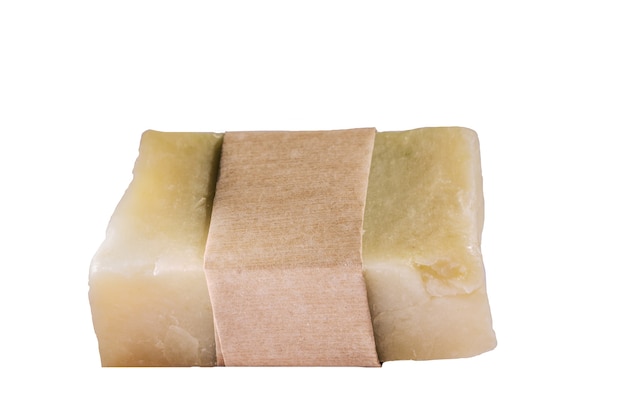 Natural herbal handmade soaps with empty wrapper isolated on white.