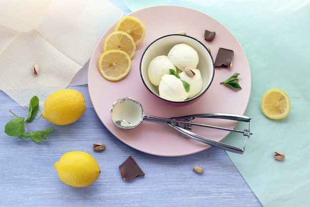 Natural ice cream, lemons on a wooden table, homemade dessert, healthy food