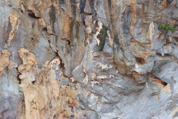 Natural marble stone cliff precipice texture background.