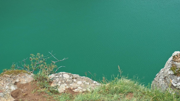 Natural monument, mountain lake Gizhgit with deep green water. Elbrus region, Kabardino-Balkarian