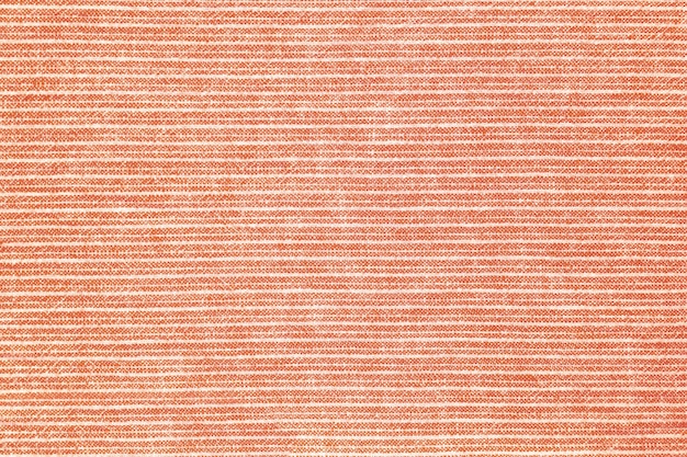 Natural orange linen texture with striped pattern as background wallpaper Top view flat lay