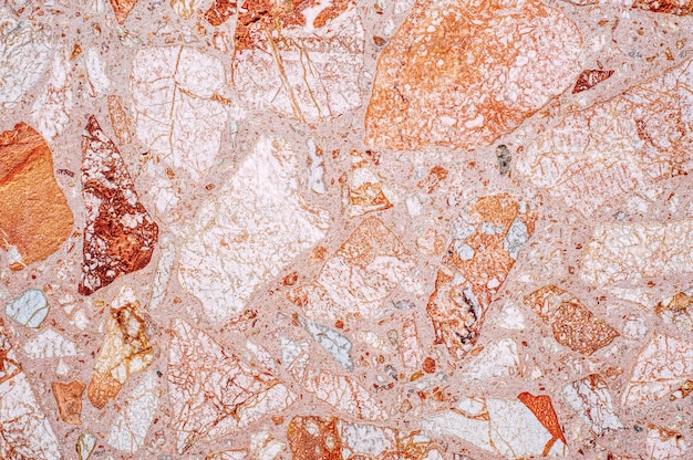 Natural orange marble surface, top view.