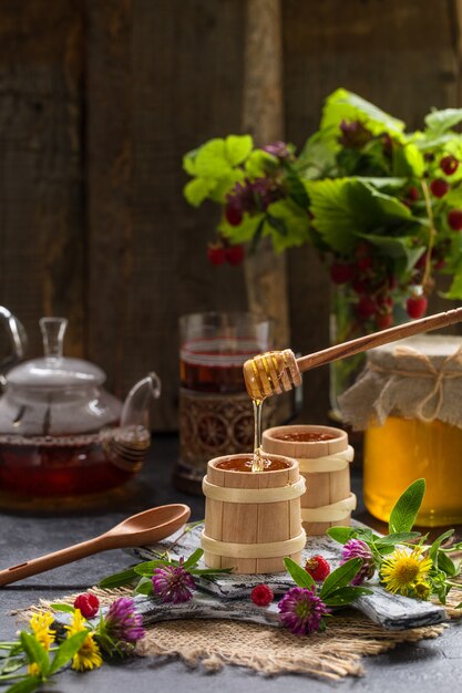 Natural organic honey on a wooden table