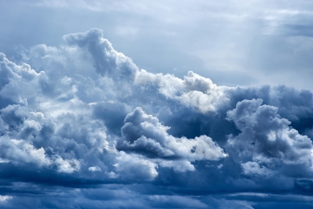 Natural phenomenon dark clouds on gray sky