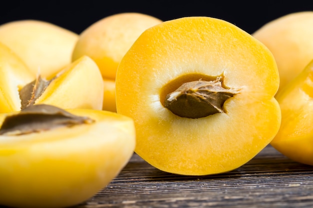 Natural ripe and delicious and sliced orange apricots while cooking