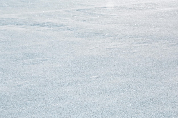 Natural snow texture white blue snowy background frozen surface