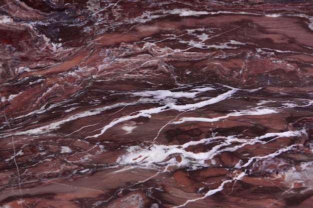 Natural stone red quartzite with white veins, called quartzite Seqoia.