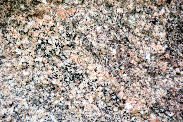 Natural stone wall background close up