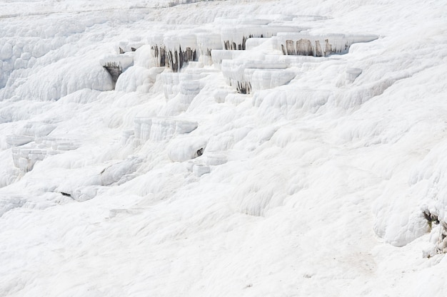 Natural travertine pools and terraces in pamukkale cotton castle in southwestern turkey