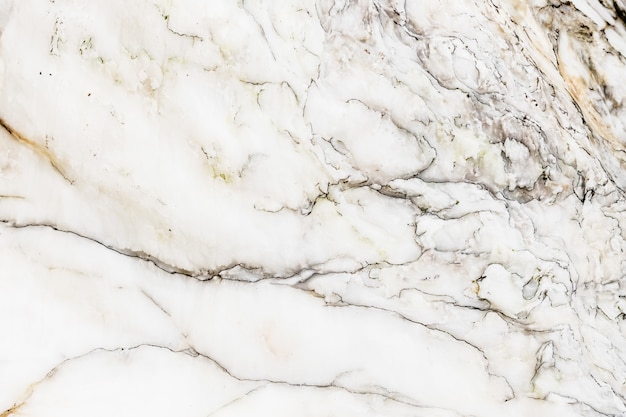 Natural unpolished White marble texture with dark pattern for background or design art wor