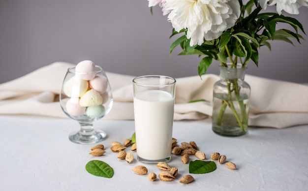 Natural vegetable almond milk on the table.