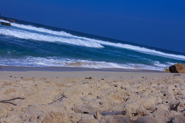 Natural white sand and blue sea water