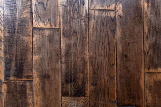 Natural wood shabby background closeup Dark wooden texture Old parquet