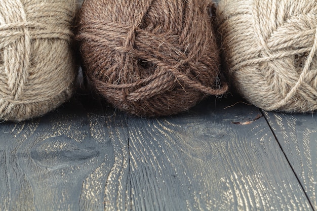 Natural wool for knitting on table