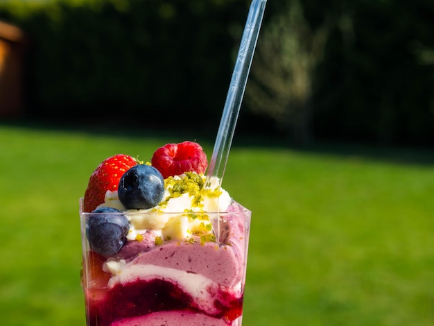 Natural yogurt with fresh berries and nuts Healthy fresh summer dessert